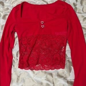 Chic Red Lace Long Sleeve Top with Heart Details